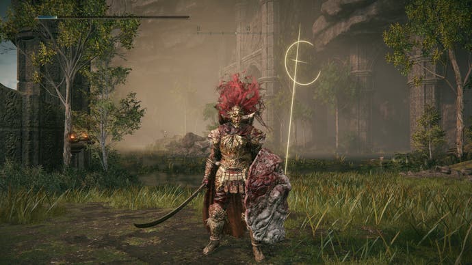 A warrior stands in front of the Miquella's Cross location in the Ancient Ruins of Rauh.