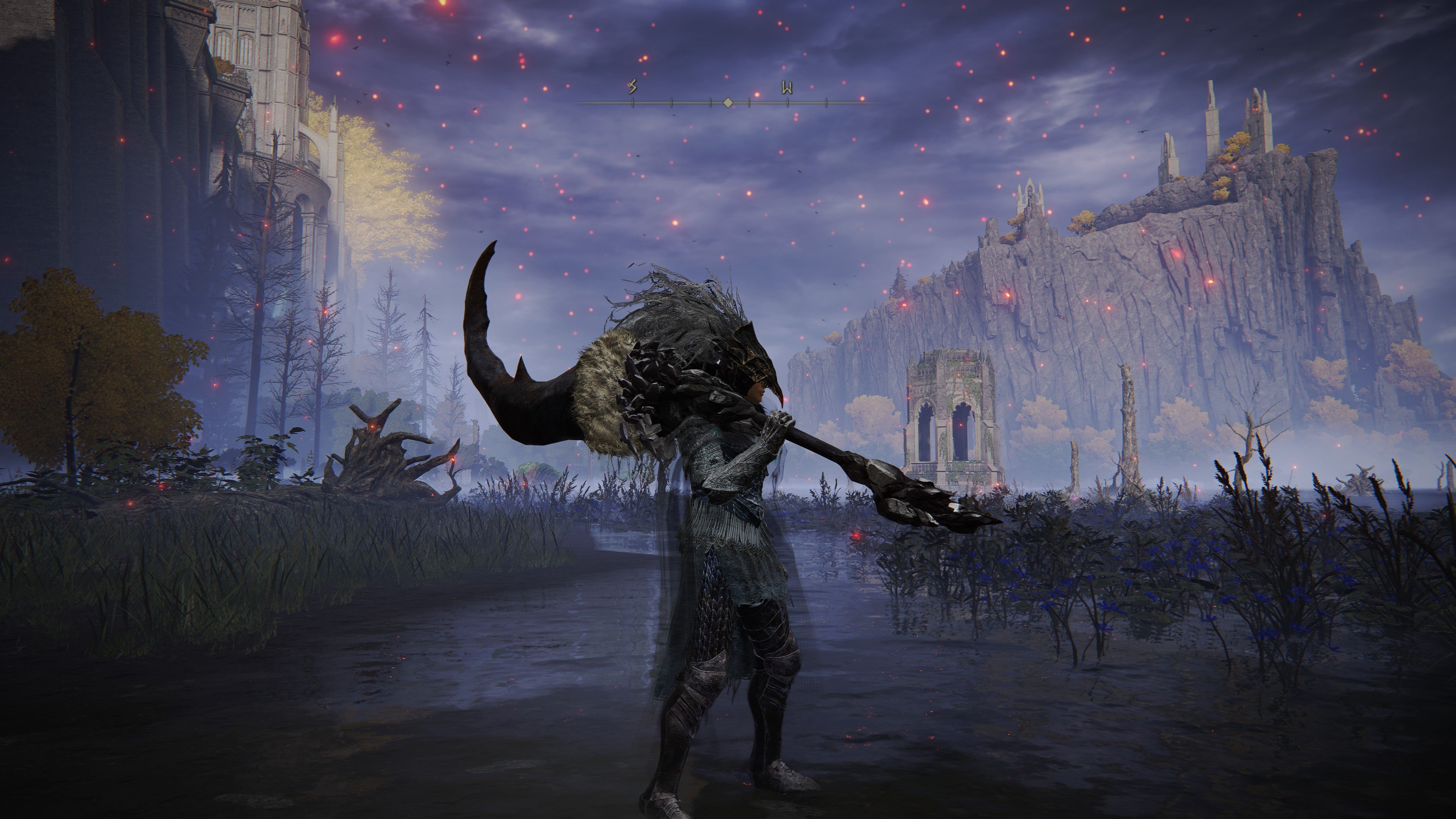 A warrior holds the Fallingstar Beast Jaw in Elden Ring