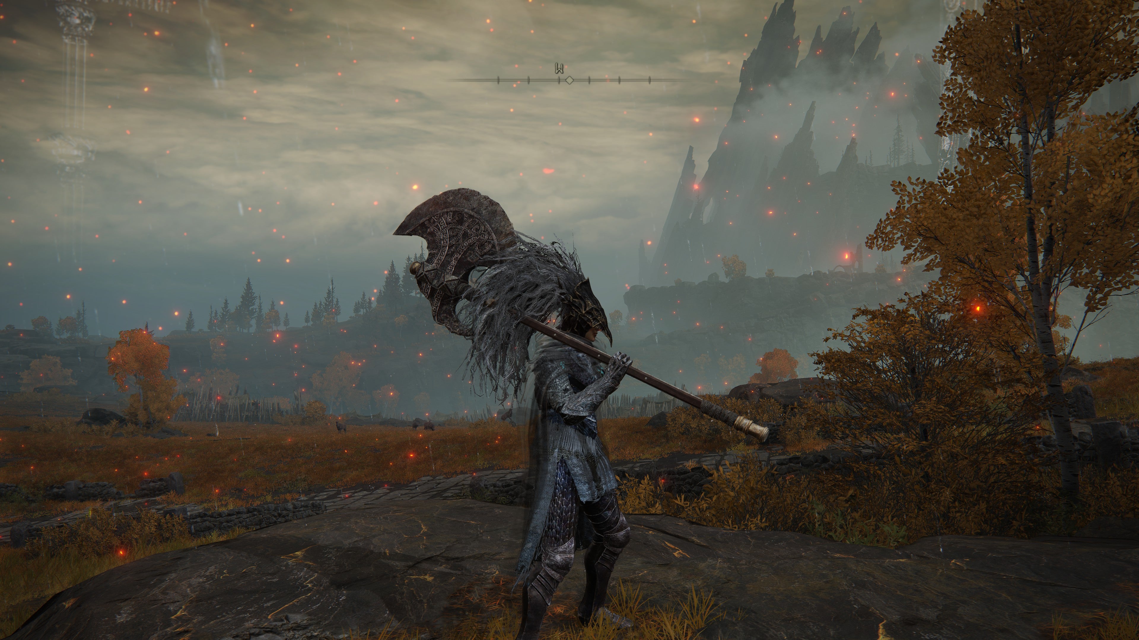 A warrior holds the Axe of Godfrey in Elden Ring