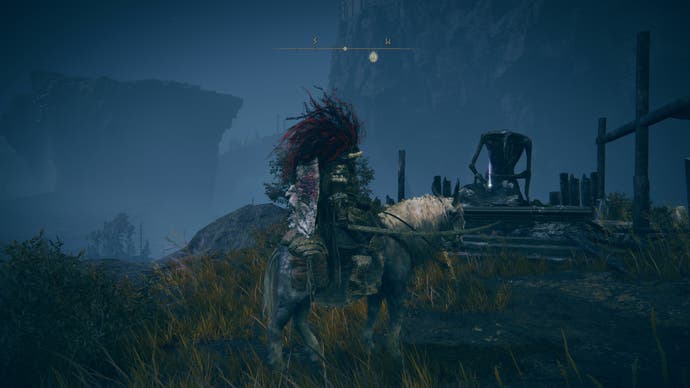A warrior on horseback approaches a statue holding a Revered Spirit Ash in the Temple Town Ruins at night in Elden Ring Shadow of the Erdtree.