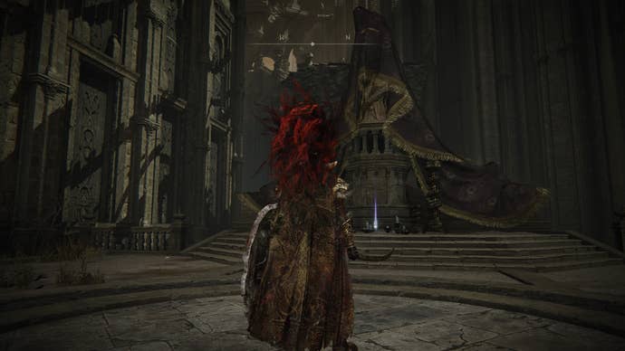 A warrior approaches a statue on an altar in Enir Ilim’s hidden path to Belurat Tower Settlement to claim a Scadutree Fragment in Elden Ring Shadow of the Erdtree.