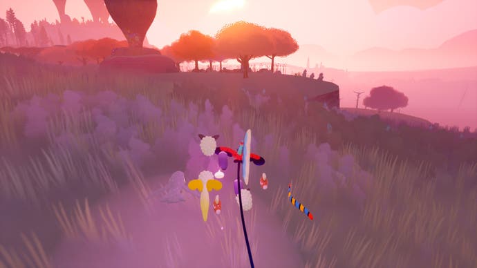 Sunset in Flock with the sky burning bright as the player and their flock approach a horizon filled with a cluster of trees.