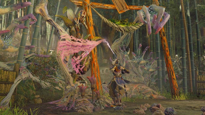 A warrior waves a purification sword at a cocooned villager next to a torii gate in Kunitsu-Gami: Path of the Goddess