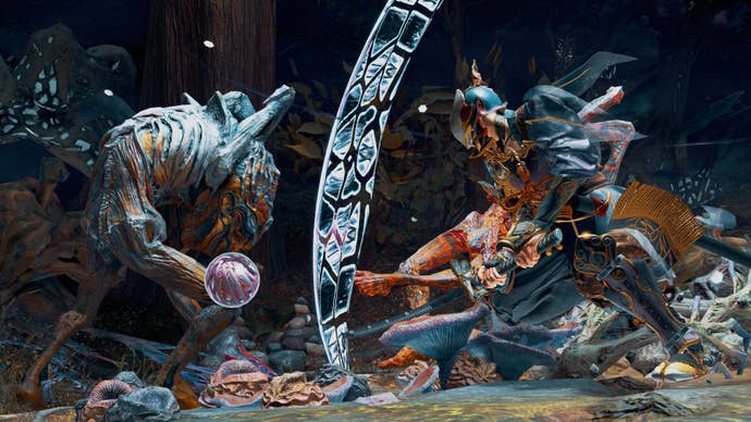 A warrior slashes their sword at a demon with a blue arc effect in Kunitsu-Gami: Path of the Goddess