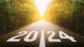 A stock photo/illustration showing a straight road narrowing into a sunny distance, flanked on either side by dense forest. On the ground at the beginning of the road, nearest the viewer, are the numbers 2024, and an arrow in the middle pointing ahead.
