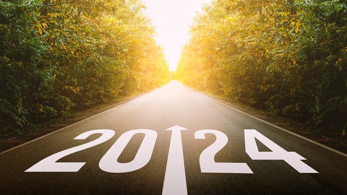 A stock photo/illustration showing a straight road narrowing into a sunny distance, flanked on either side by dense forest. On the ground at the beginning of the road, nearest the viewer, are the numbers 2024, and an arrow in the middle pointing ahead.
