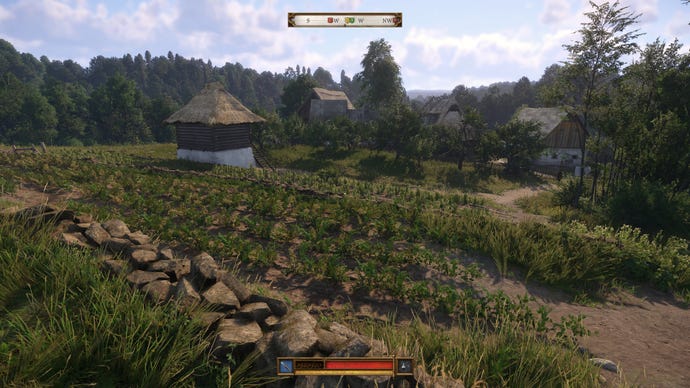 Beautiful hillsides filled with crops in Kingdom Come: Deliverance 2