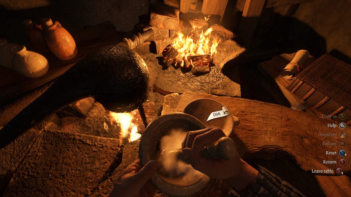 Somebody grinding herbs at an alchemy station in first-person view in Kingdom Come: Deliverance 2