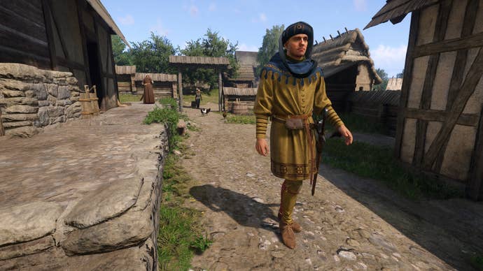 A man in noble finery sauntering through a village in Kingdom Come: Deliverance 2