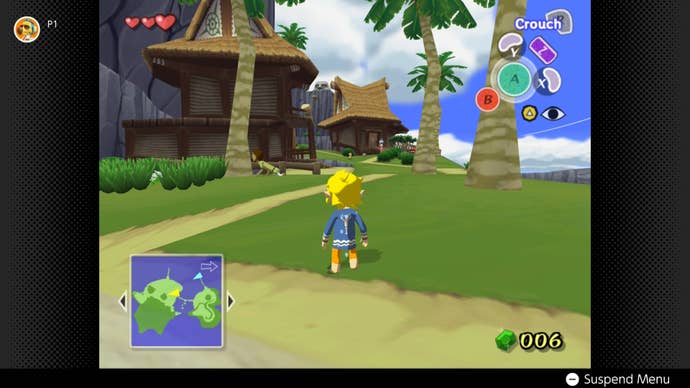 Link stands in the grass in his pyjamas, facing grandma's house in The Wind Waker.