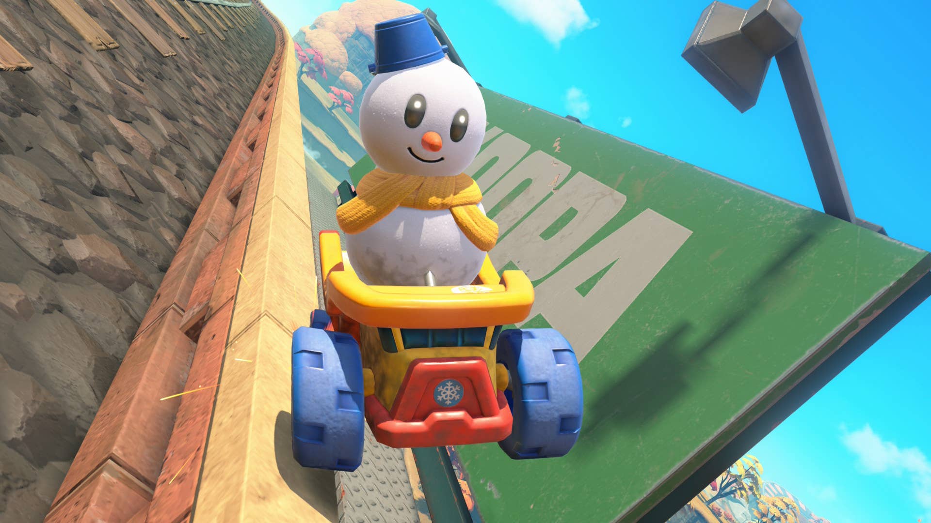 A snowman grinds past a billboard in Mario Kart World.