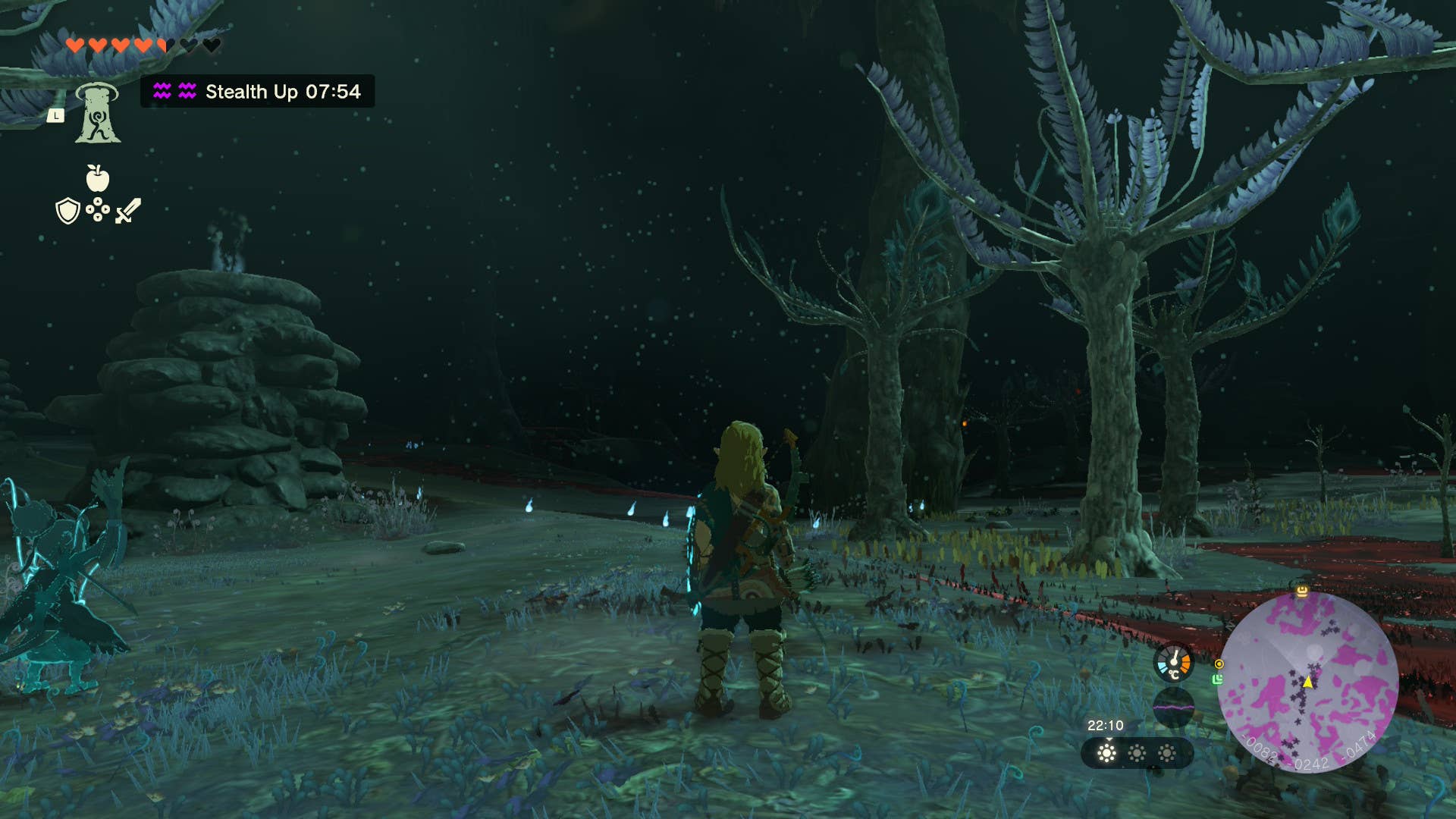 Link stands by a tree in the Depths of Hyrule in Tears of the Kingdom.