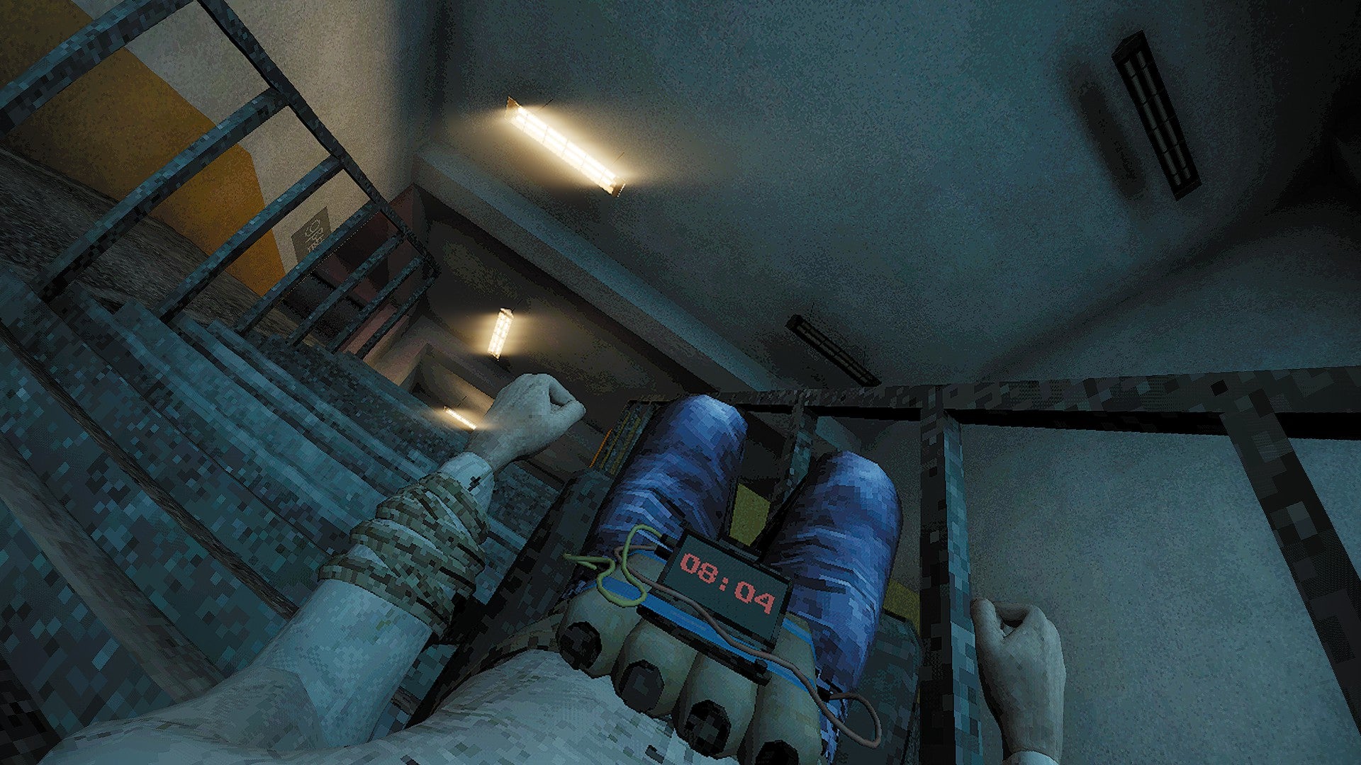 A first-person view of a man strapped to a tipped-over chair, lying on a stairway in a spooky office building. - 1