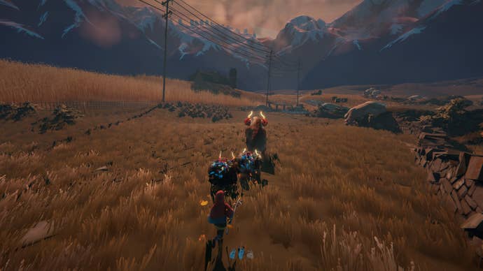 A shepherd and a herd of goatlike creatures charging implicit a grassy brownish tract successful Herdling, with mountains up ahead.