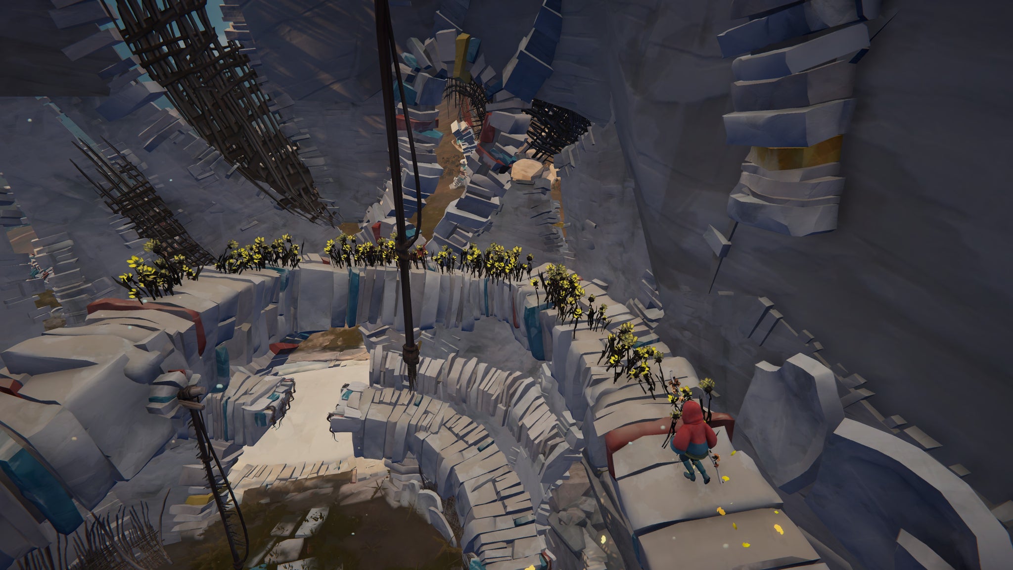 A boy running around a spiralling series of drystone paths inside a curved stone structure, from Herdling. - 12