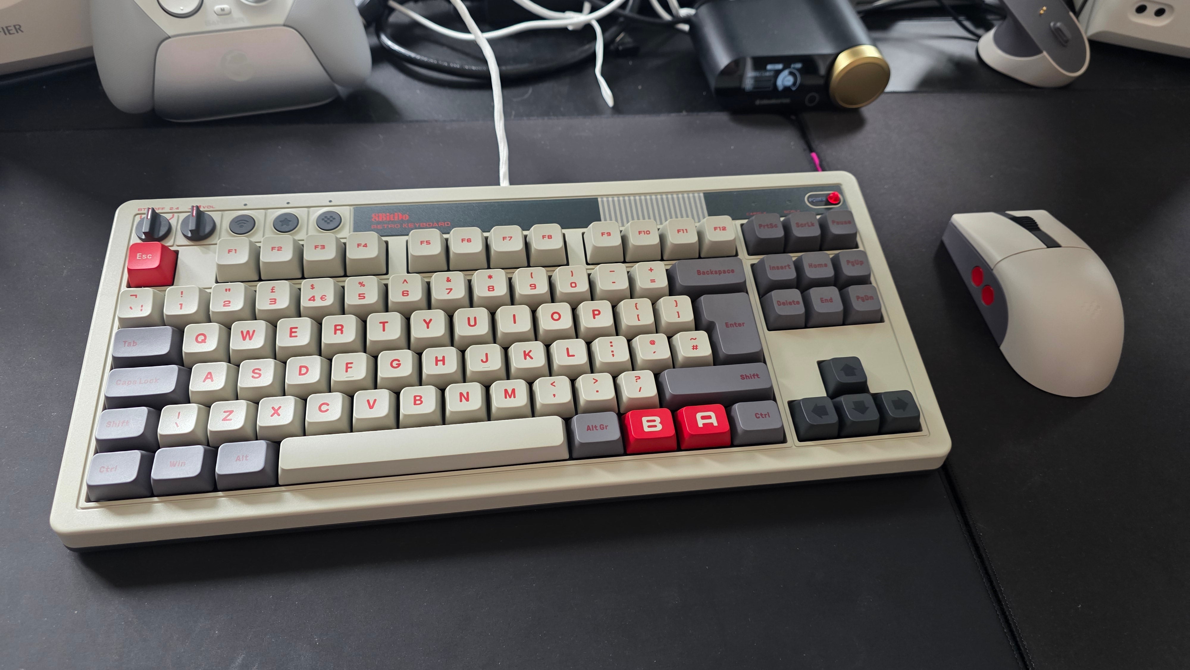 8bitdo Retro Mechanical Keyboard (N edition) on a desk next to a matching mouse