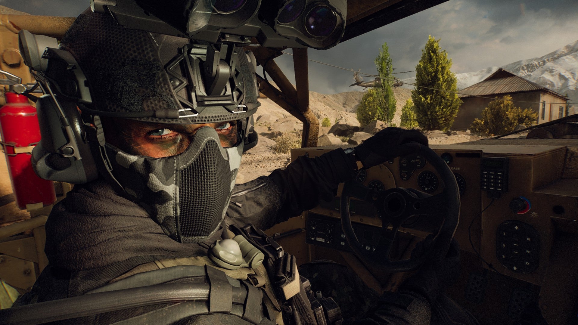 A man in a face mask and a helmet with a lot of scopes looking at you while driving a car through rocky countryside in Battlefield 6. - 1