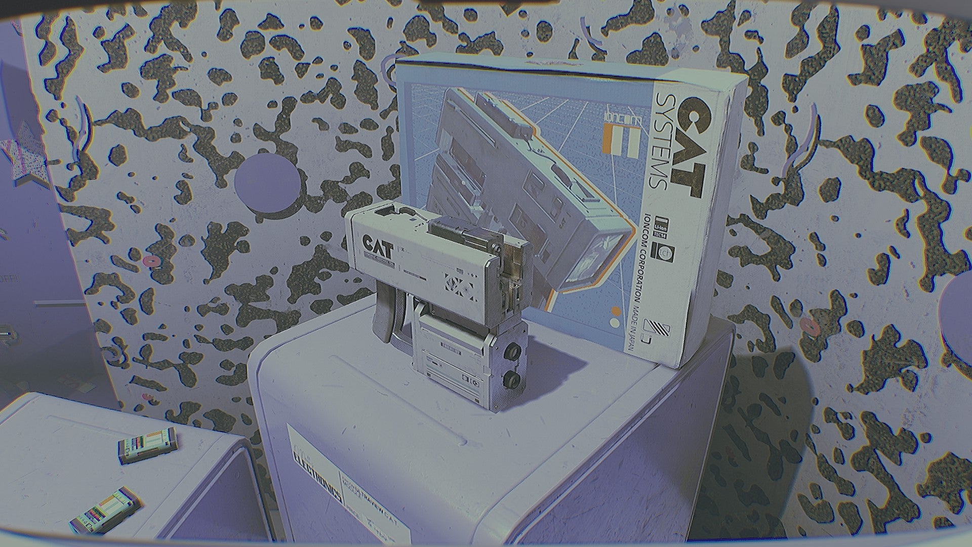 A showroom display of a boxy 80s-style sci-fi scanning tool from Routine. - 1