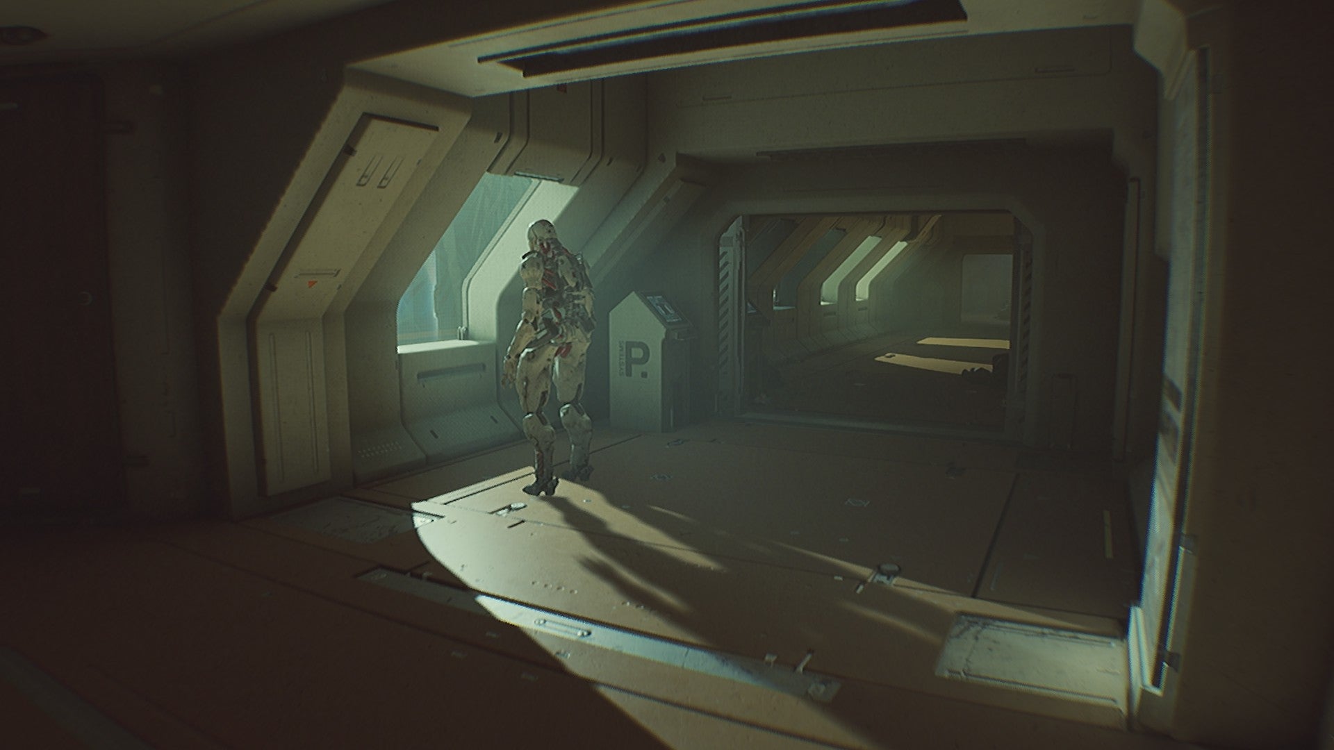 A robot standing motionless by a window in a moonbase corridor from Routine.