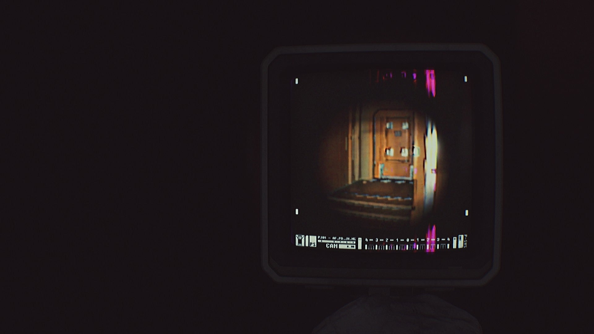 A pitch-black area illuminated by means of a handheld scanner display in Routine. - 11