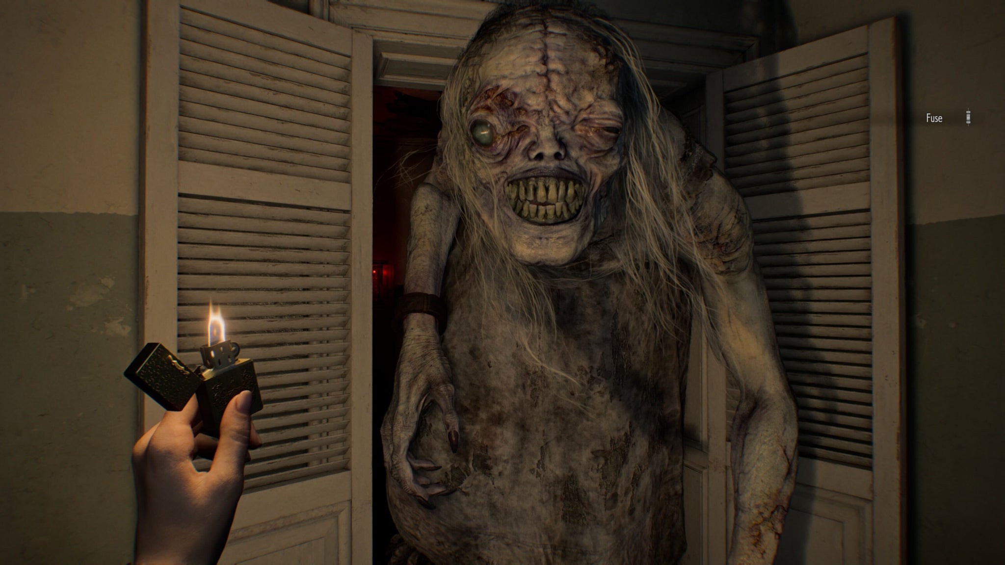 A horrifying monster emerging from a cupboard in Resident Evil Requiem