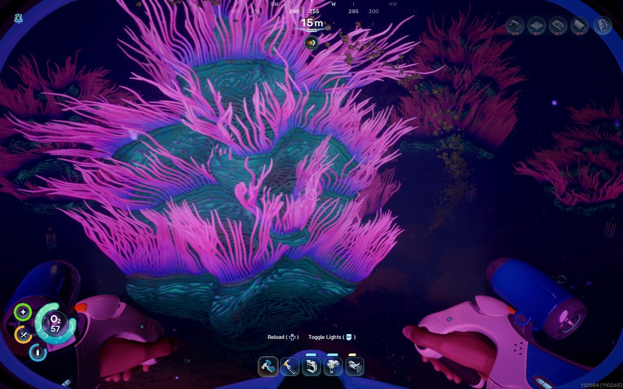 A vividly glowing pink and purple undersea plantlike organism in Subnautica 2.