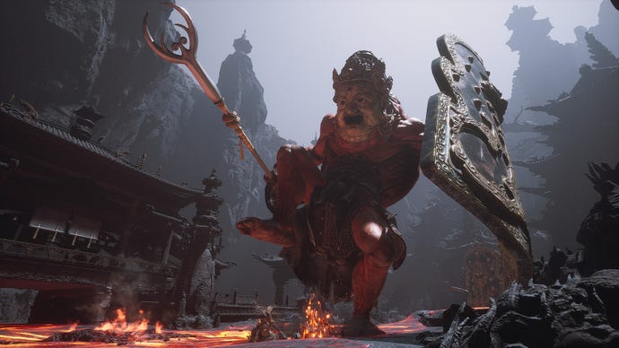 A giant Sea Rakshasha prepares to stomp the Destined One in Black Myth: Wukong.