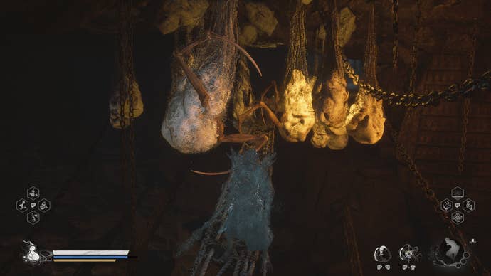 The Destined One, in Cloud Step form, stands in front of a bunch of cocoons in in Black Myth: Wukong’s Webbed Hollow.