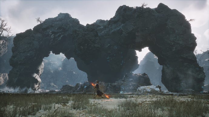 Giant Shigandang looms over the tiny-in-comparison Destined One in this secret area in Black Myth: Wukong.