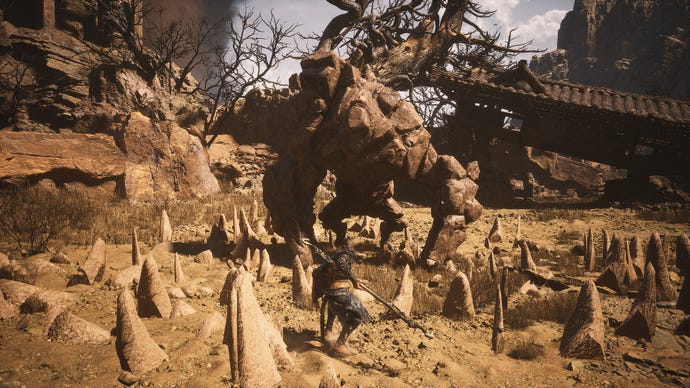 The Stone Vanguard shoots up an array of smaller stones around the Destined One in this Black Myth: Wukong boss fight.