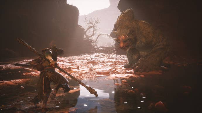 Fighting the Mad Tiger at the bottom of the Sandgate Village well in Black Myth: Wukong’s Chapter 2.