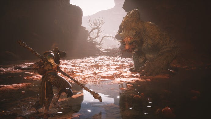 Fighting the Mad Tiger at the bottom of the Sandgate Village well in Black Myth: Wukong’s Chapter 2.