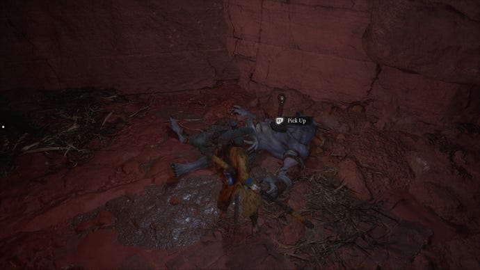 Standing over a dead rat in the Pagoda Realm in Black Myth: Wukong.