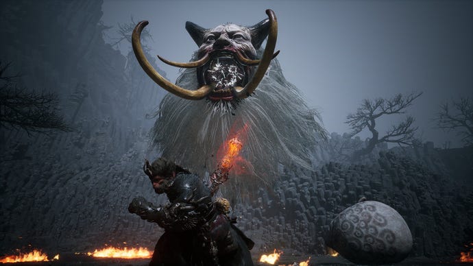 The Destined One runs from the huge heads that are the Fast As Wind and Quick As Fire duo in Black Myth: Wukong.