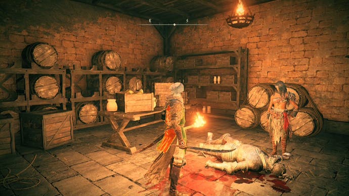 A warrior stands in a store room holding a torch over a head body in Elden Ring