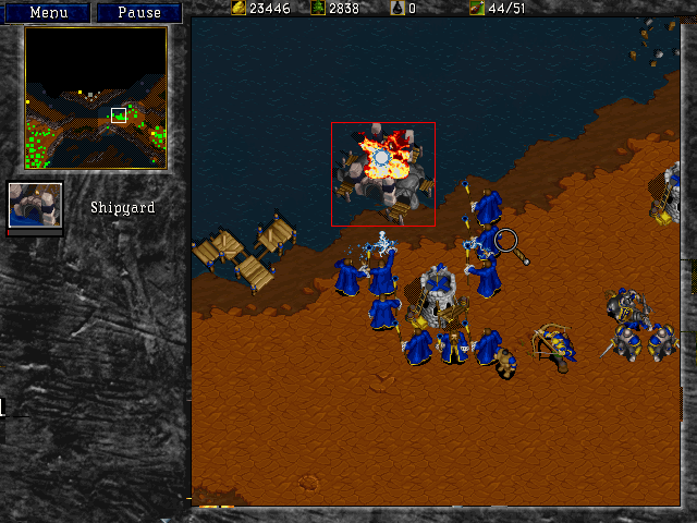 Warriors attack a shipyard in Warcraft 2