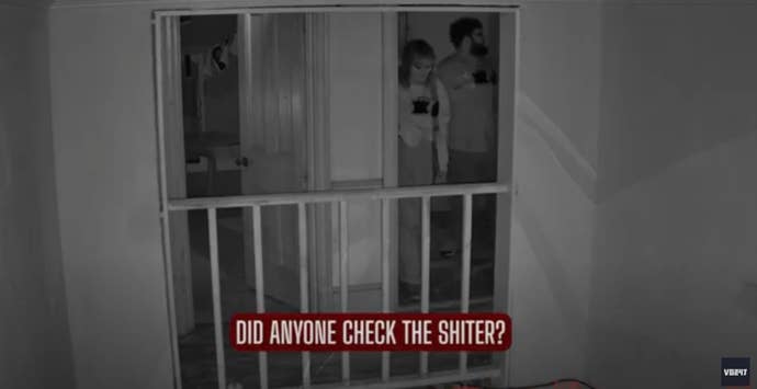 Nighttime CCTV footage of the VG247 team exploring a haunted house, with the subtitle "did anyone check the toilet?"