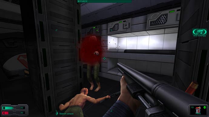2. A screenshot of System Shock 2: 25th anniversary remaster showing the player blasting a shotgun hybrid with a shotgun.