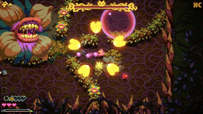 A scene of battle in Morsels, featuring a huge carnivorous plant with gnashing teteh, some pink bubbles, and assorted spiky objects.
