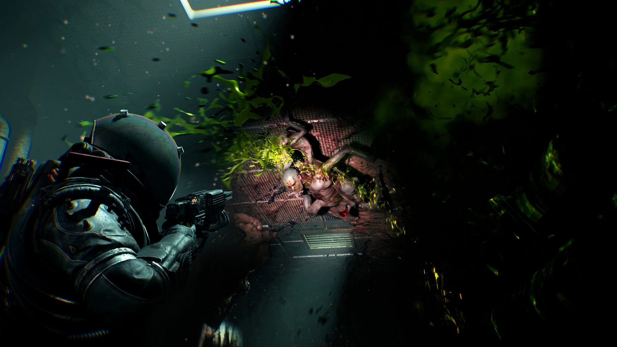 A person in a big bulbous spacesuit shooting at a ceiling-mounted icky zombie enemy in Cronos: The New Dawn. - 1