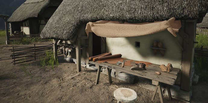 A woody array nether an awning by a location with immoderate cloth and tools connected it, from Manor Lords