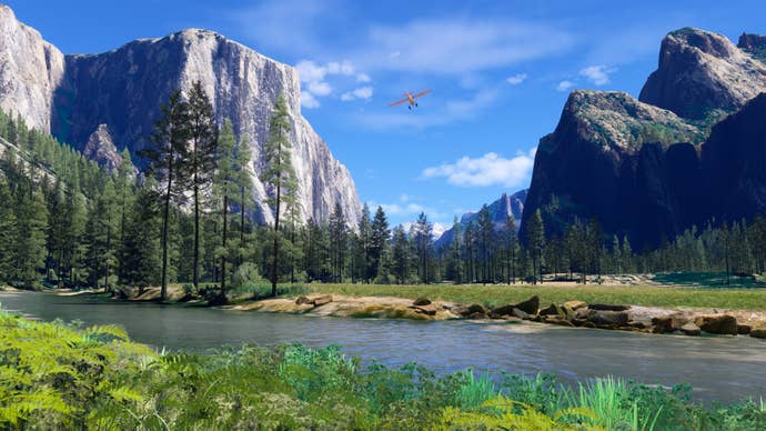 A forested riverside with cliffs and mountains behind in Microsoft Flight Simulator 2024