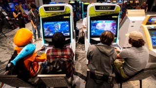 2XKO at Combo Breaker 2024 - four people playing the game on custom cabs.