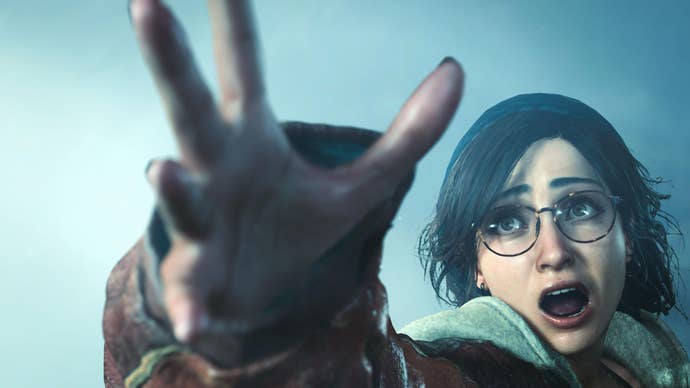 Monster Hunter Wilds screenshot showing woman with glasses reaching out