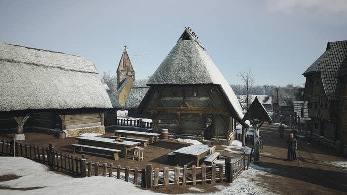 A snowy tavern exterior successful Manor Lords