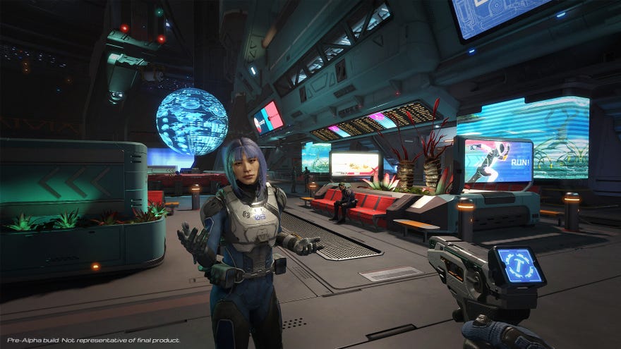 A woman talking to you in SpaceCraft, with screens and holographic globes visible in the huge hallway behind