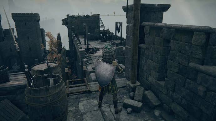 A warrior stands on the rooftops of Castle Morne in Elden Ring.