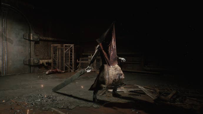 A screenshot from the Silent Hill 2 remake showing Pyramid Head advancing to the right