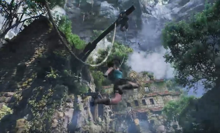 Lara Croft swinging from a rope in some kind of forest temple in a possible blurry leaked Tomb Raider image. - 5