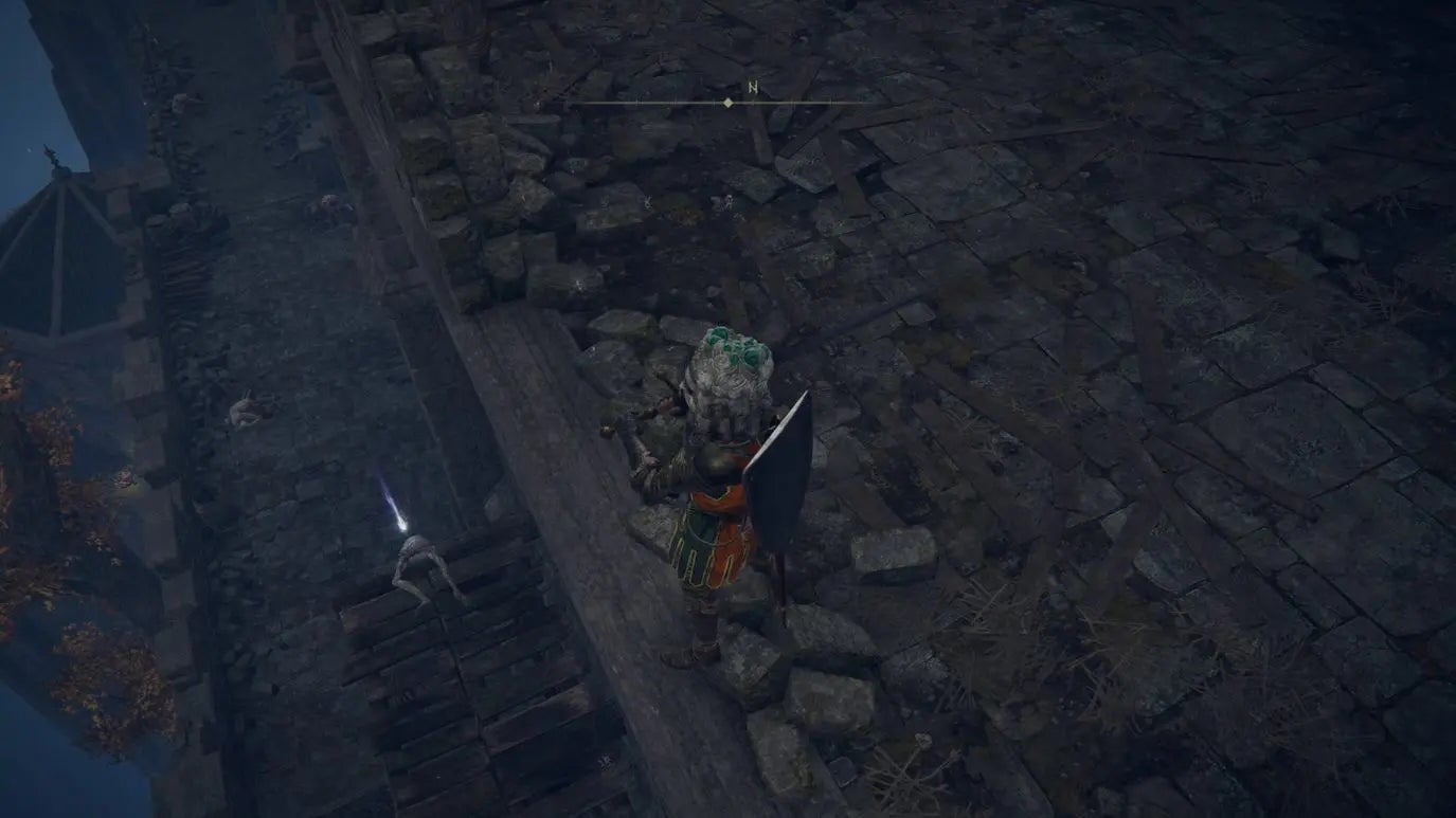 A warrior looks down on a corpse lying on the side of a ledge in Castle Morne in Elden Ring.